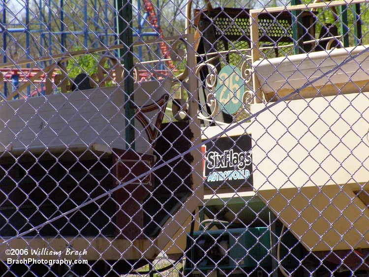 At the end of the 2005 season, Six Flags closed down Six Flags Astroworld in Houston, Texas (directly nextdoor to the Astrodome - Home of the then Houston Oilers and Houston Astros) to redevelop the land.  Rides were dismantled and shipped elsewhere around the country.  The railroad cars from the 610 Limited were sent to Six Flags America.  Here's the Six Flags Astroworld signage still on the train cars.