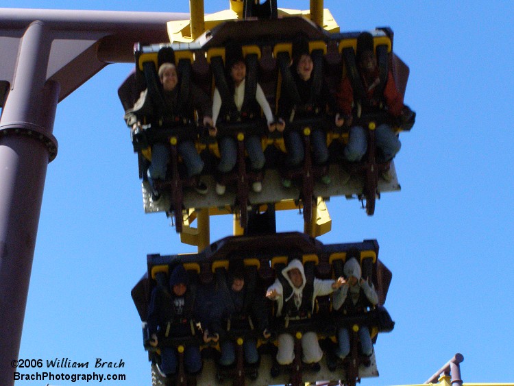 These people are flying on the Batwing coaster at Six Flags America.