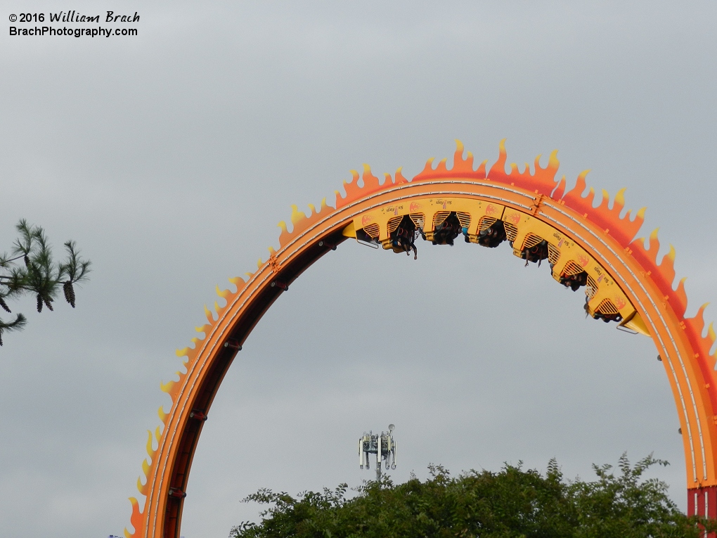 The Bourbon Street Fireball ride gondola rises to the top.