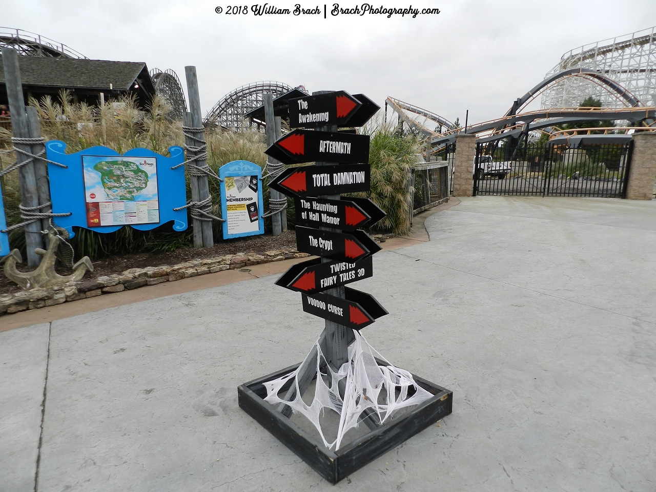 Directional arrows pointing towards various attractions of Fright Fest.