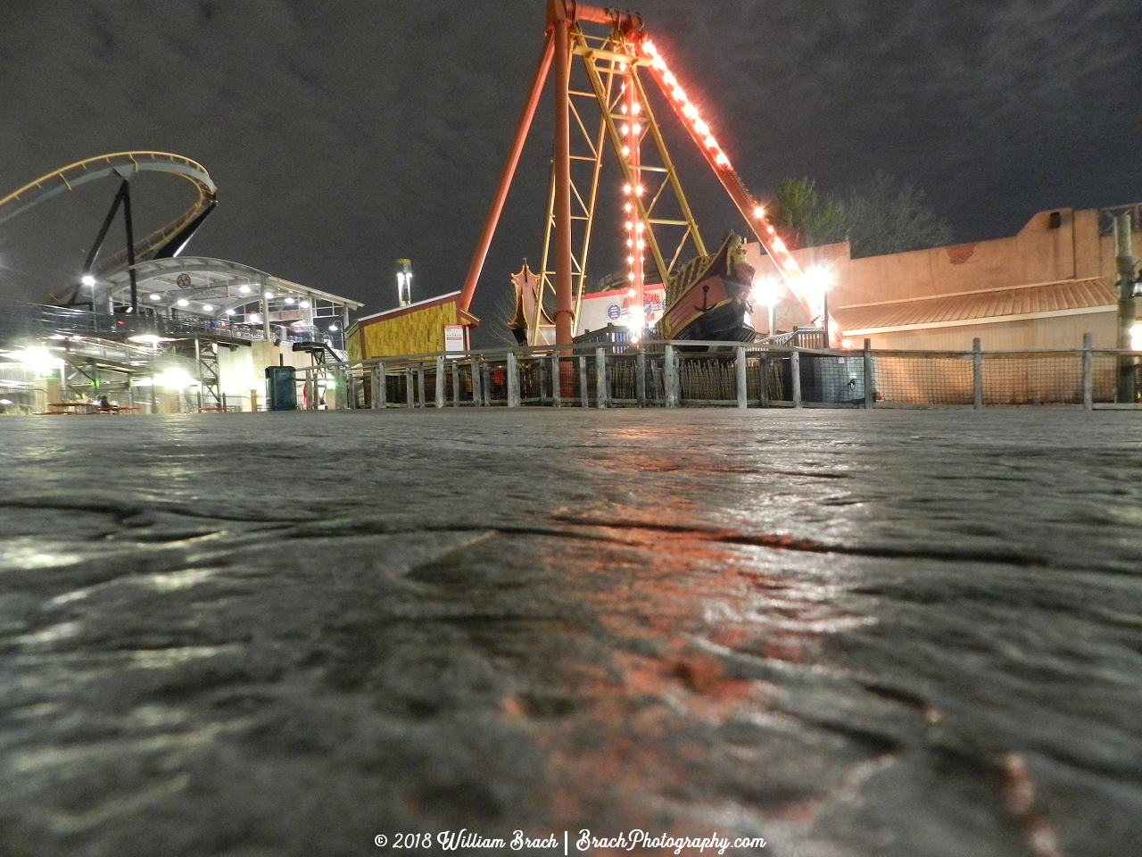 Classic Arrow Pirate Ship ride at night at Six Flags America.