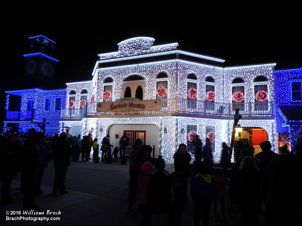 The lines to see Santa were quite long throughout the evening.  Love how well lit up the buildings were in the North Pole part of the park.