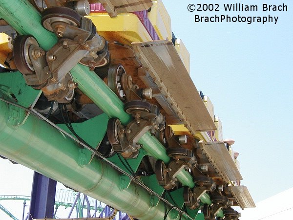 Looking under the yellow train and checking out the wheel assembly.