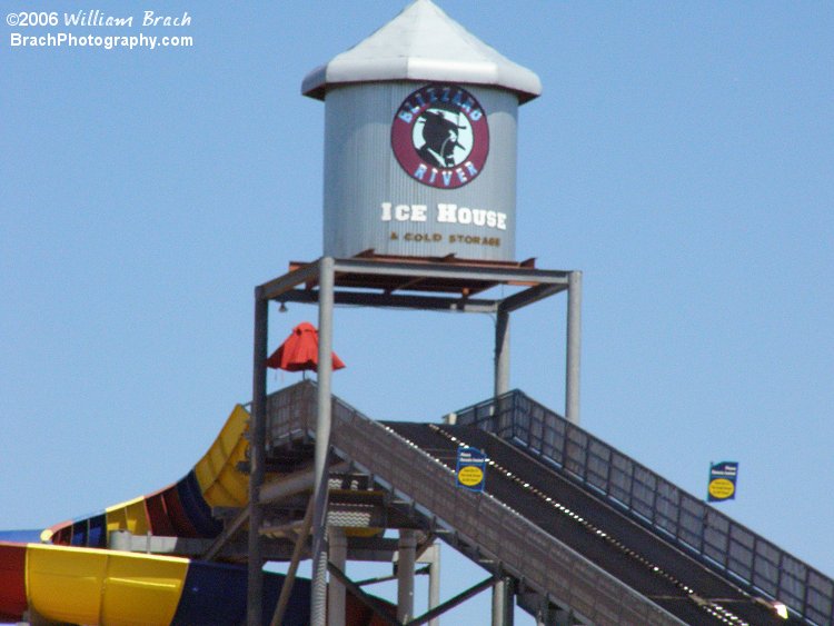 Looking at the top of the Penguin's Blizzard River and see the theming Ice House at the top of the lift hill.