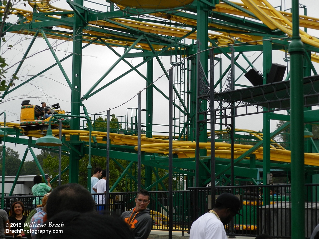 Yellow car going through the spinning section of the ride.