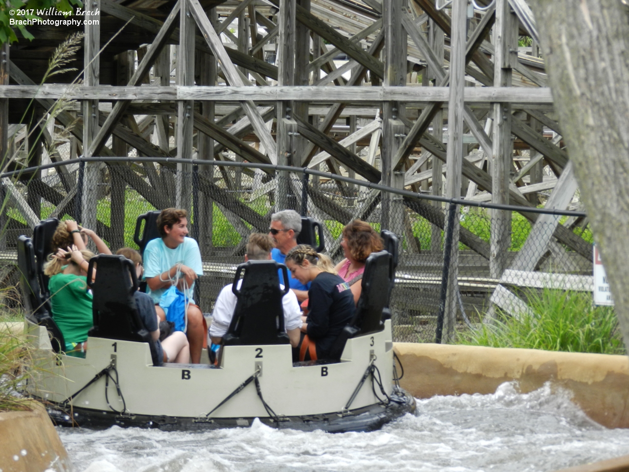 Renegade Rapids raft loaded with riders making its way around the course.