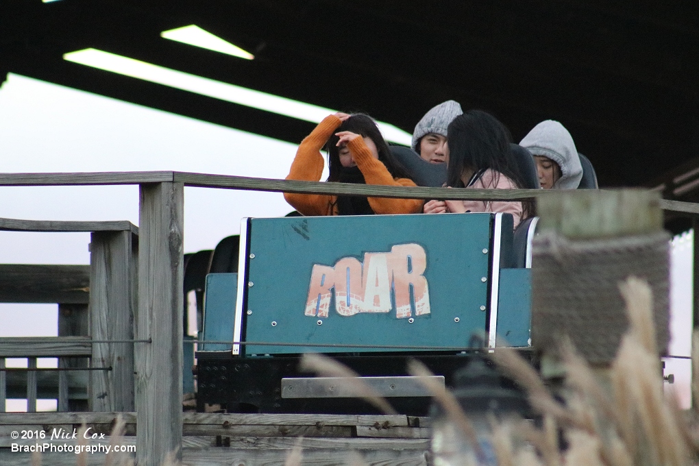 The logo on the front of the train.