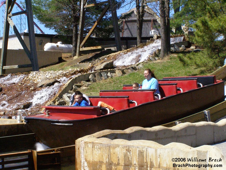 Shipwreck Falls boat about to splash into the water pool that will not only soak the riders, but all the people watching the ride.