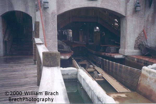 Taking a look inside the ride's station.  The ride was not operational the day I visited in 2000 - which would explain why the water level is low.