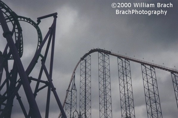 Train going up the lift hill on Superman: Ride of Steel and some of Joker's Jinx.