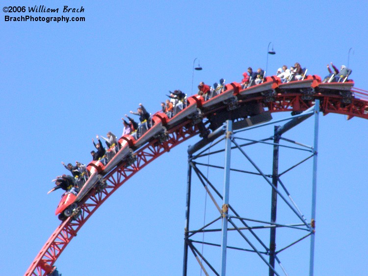 Superman: Ride of Steel's red train cresting the lift hill.  Superman has two trains, one red as you see here and the other train is blue.