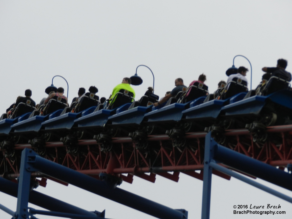 Blue train going up the lift hill on Superman: Ride of Steel.  That's Will in the bright yellow shirt.