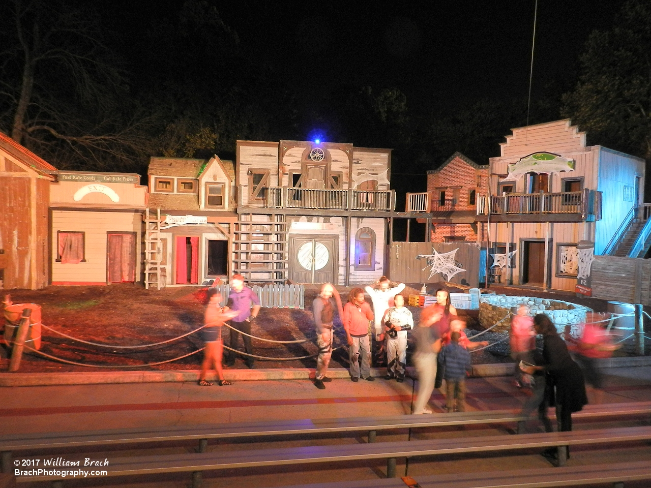 The Sword of Destiny cast posing for photos with park guests.