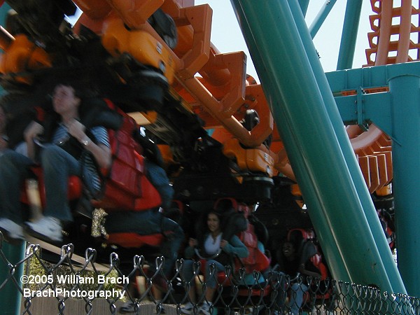 Two-Face: The Flip Side train rushing through the vertical loop.