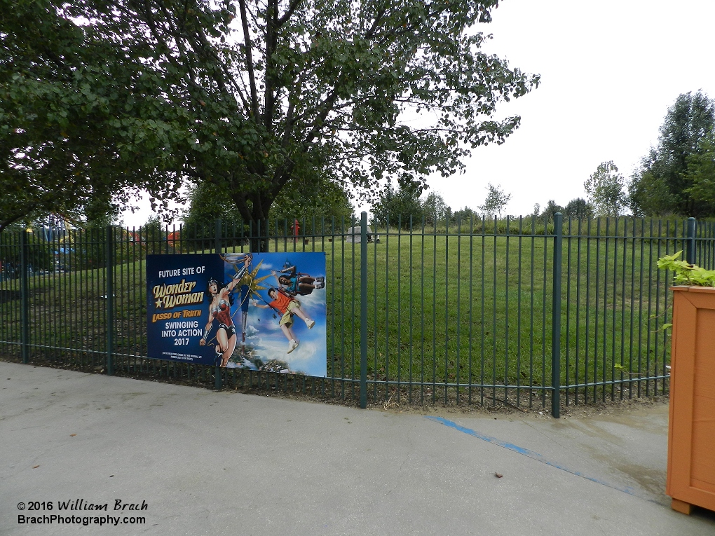 This is where the new attraction for 2017 will sit.  It's between the railroad crossing to Superman and the Smokers Garden behind Joker's Jinx.