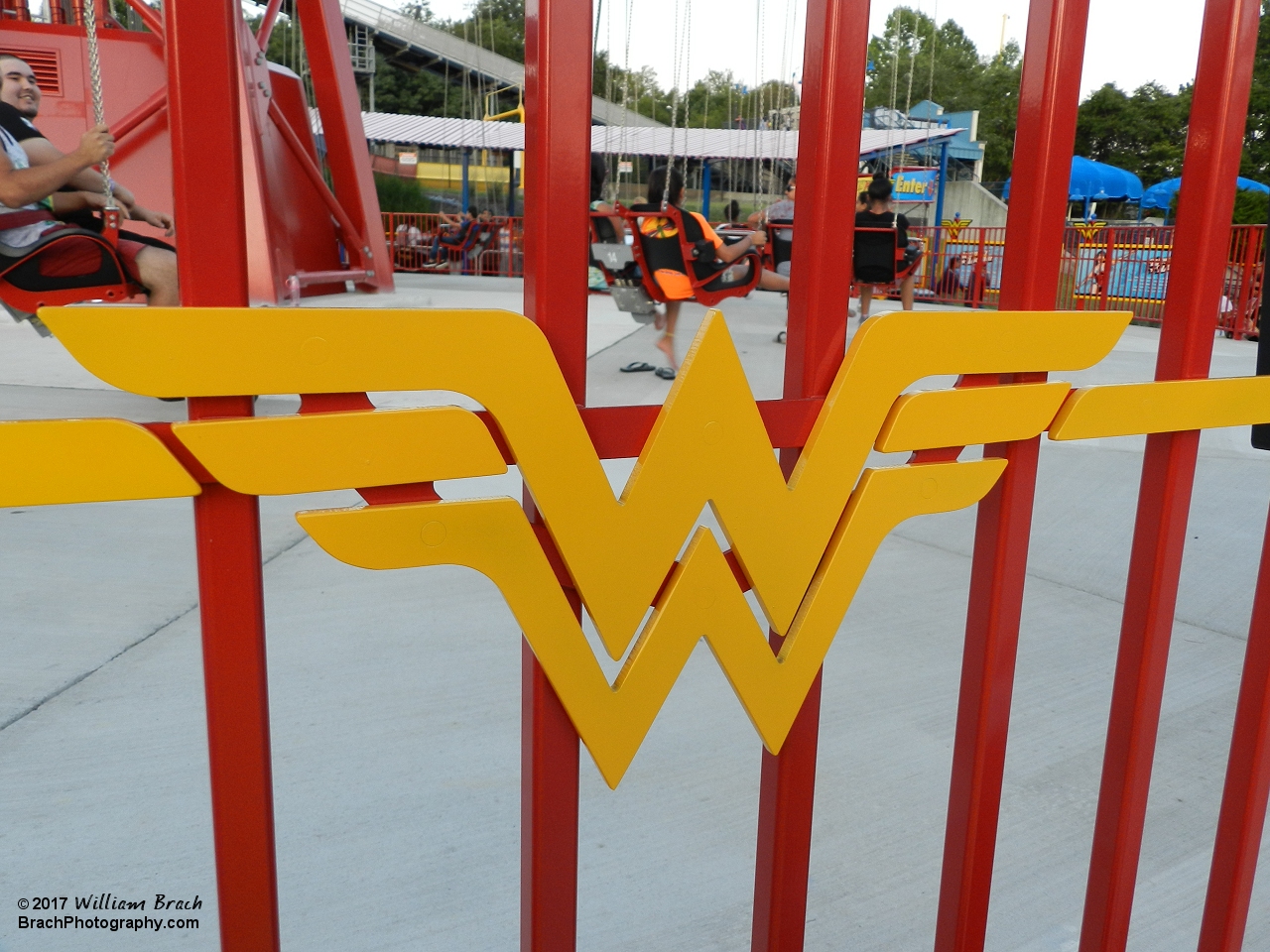 Wonder Woman logo on the fence around the ride.