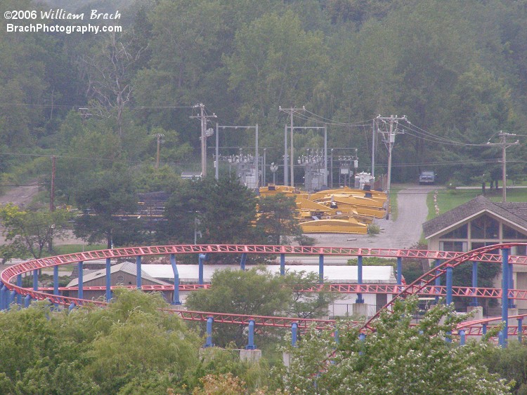 That yellow track seen beyond the helix of Superman: Ride of Steel, is the Batman: The Escape coaster that was moved from the recently closed Six Flags Astroworld in Houston, Texas.