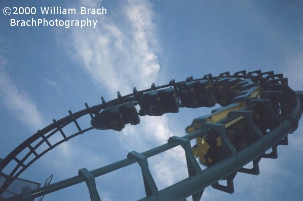 Looking up at the train running through the cobra roll.