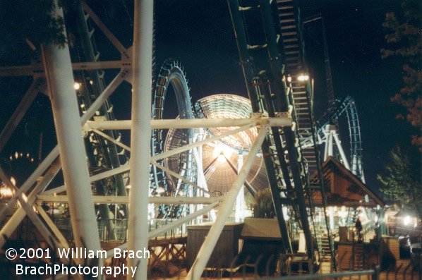 Night shot of Boomerang: Coast to Coaster.  The train is going through the vertical loop right now.