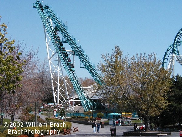 Here we see Boomerang's double lift/drop system.  The ride starts with the train being pulled up the left side backards and dropped through the station.  The train runs the course and gets stopped on the right side lift.  The chan on the right lift pulls the train up a little higher and releases it.  The train will then go through the entire course backwards.