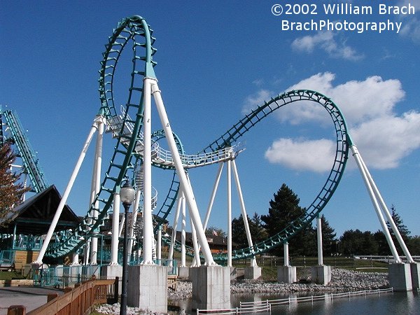 Vekoma Boomerang coasters are notorious for valleying in the middle of the cobra roll.  Vekoma installed the cat-walk and spiral staircase to assist with the evacuation of the train if it does valley.  In all the visits I made to Six Flags Darien Lake when I was in college, I had never seen this boomerang coaster valley.