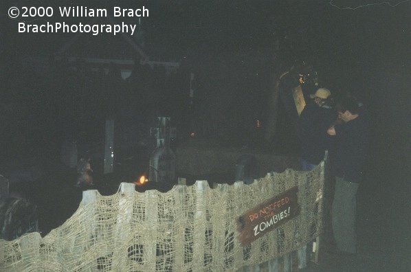 Six Flags staff setting up the lights on the Zombie Graveyard near Viper.