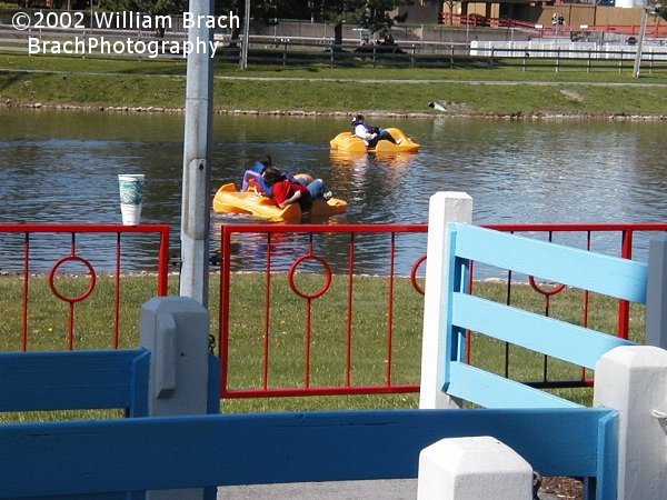 Paddle Boats out on Fun Lake.  Think this one boat is a big overloaded.  Pass the fries much?