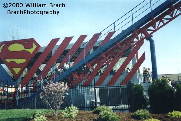 Red train going up the lift hill.