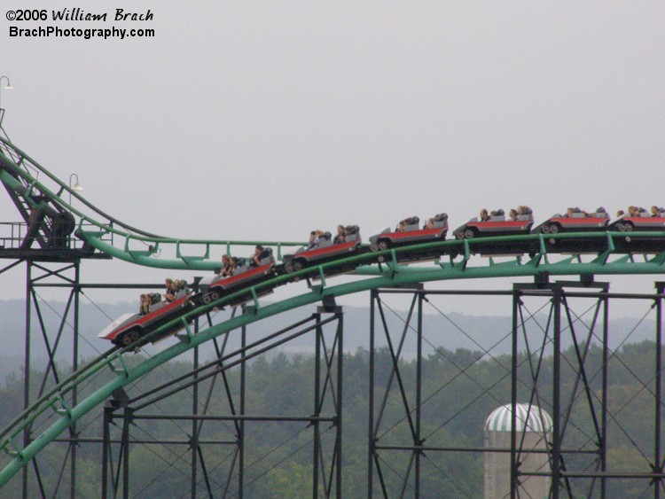 The red train going down the first drop on Viper.