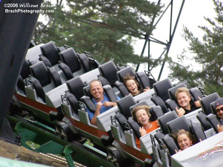 This is a rare shot for a 1982 Arrow Dynamics multilooper coaster - Smiling faces.  Here we see the red train on Viper headed towards the helix.