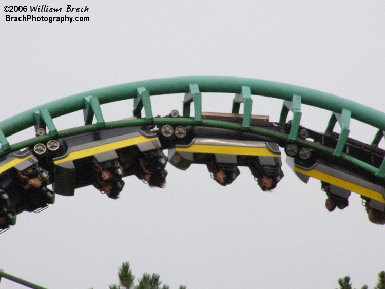 Yellow train running through the corkscrews.