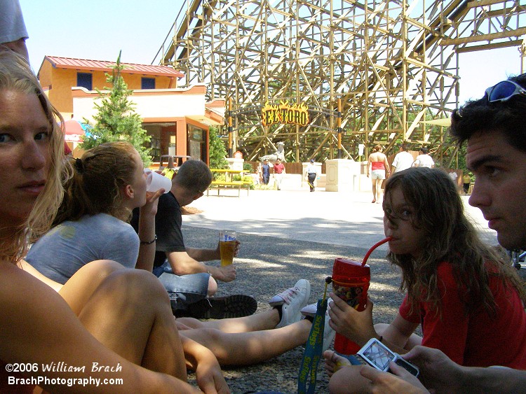 Coaster Crew members chilling in the shade near El Toro.