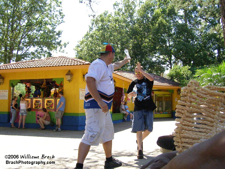 Clint pouring the rest of the water on Chris.