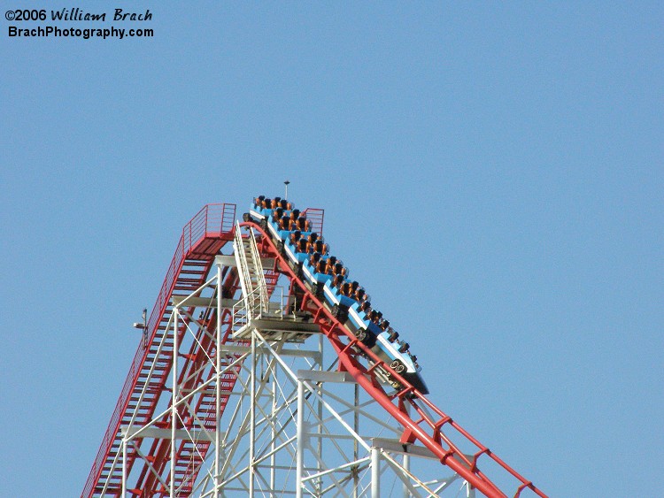 Great American Scream Machine had three trains - red, white and blue.  Here we see the blue train cresting the lift hill.