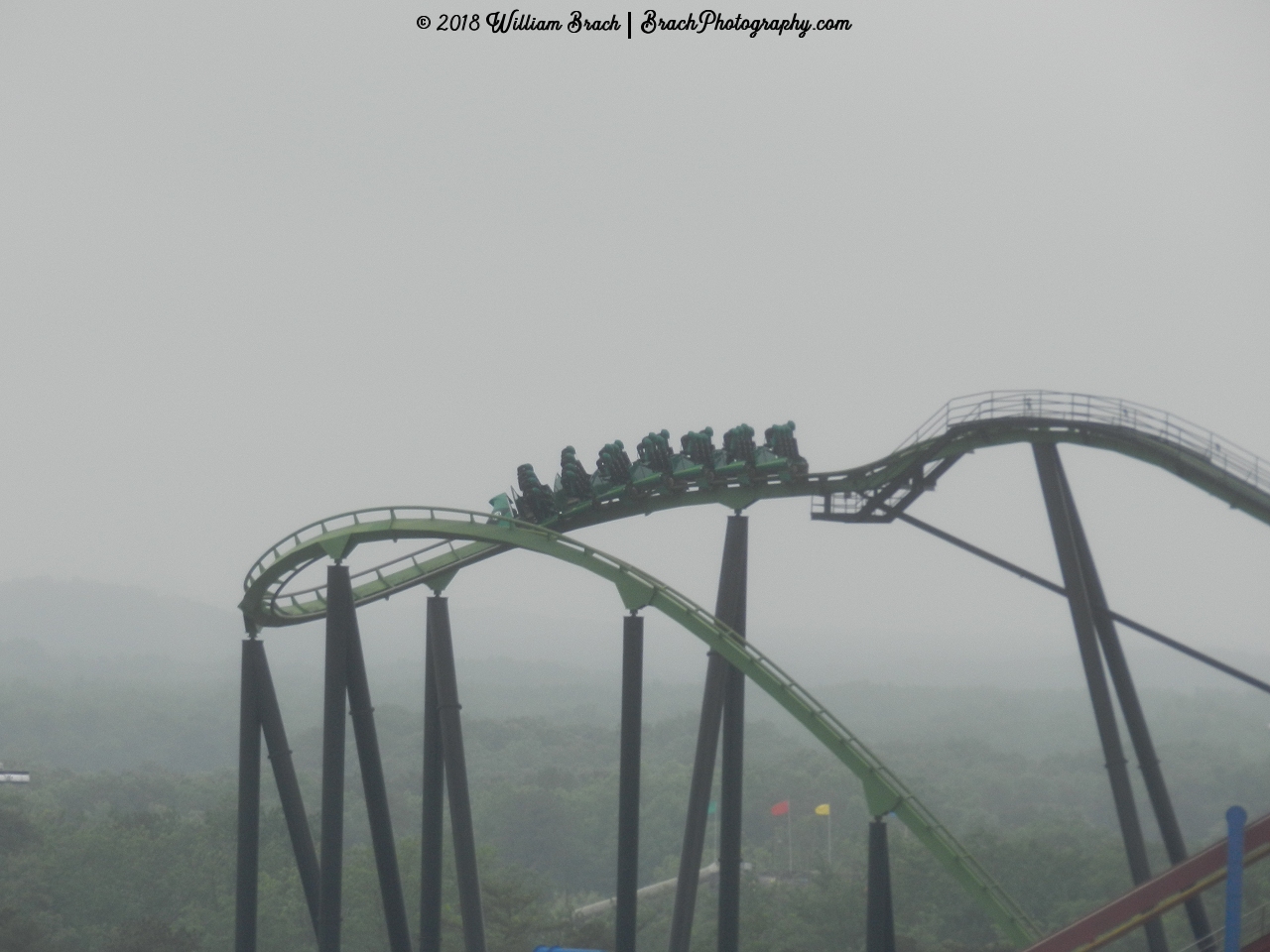 Green Lantern train cresting the top of the lift hill.