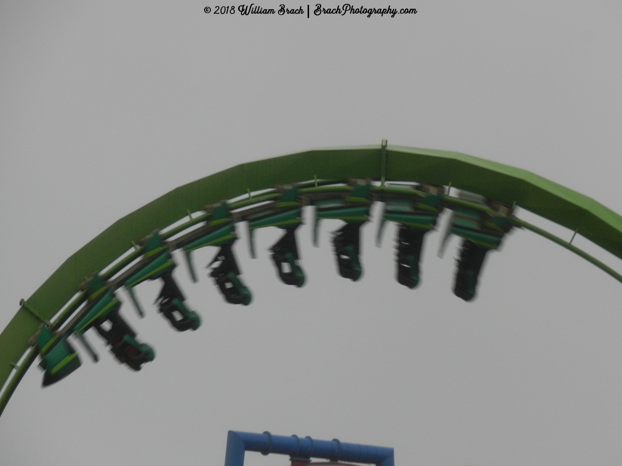 Green Lantern train upside down on the course.