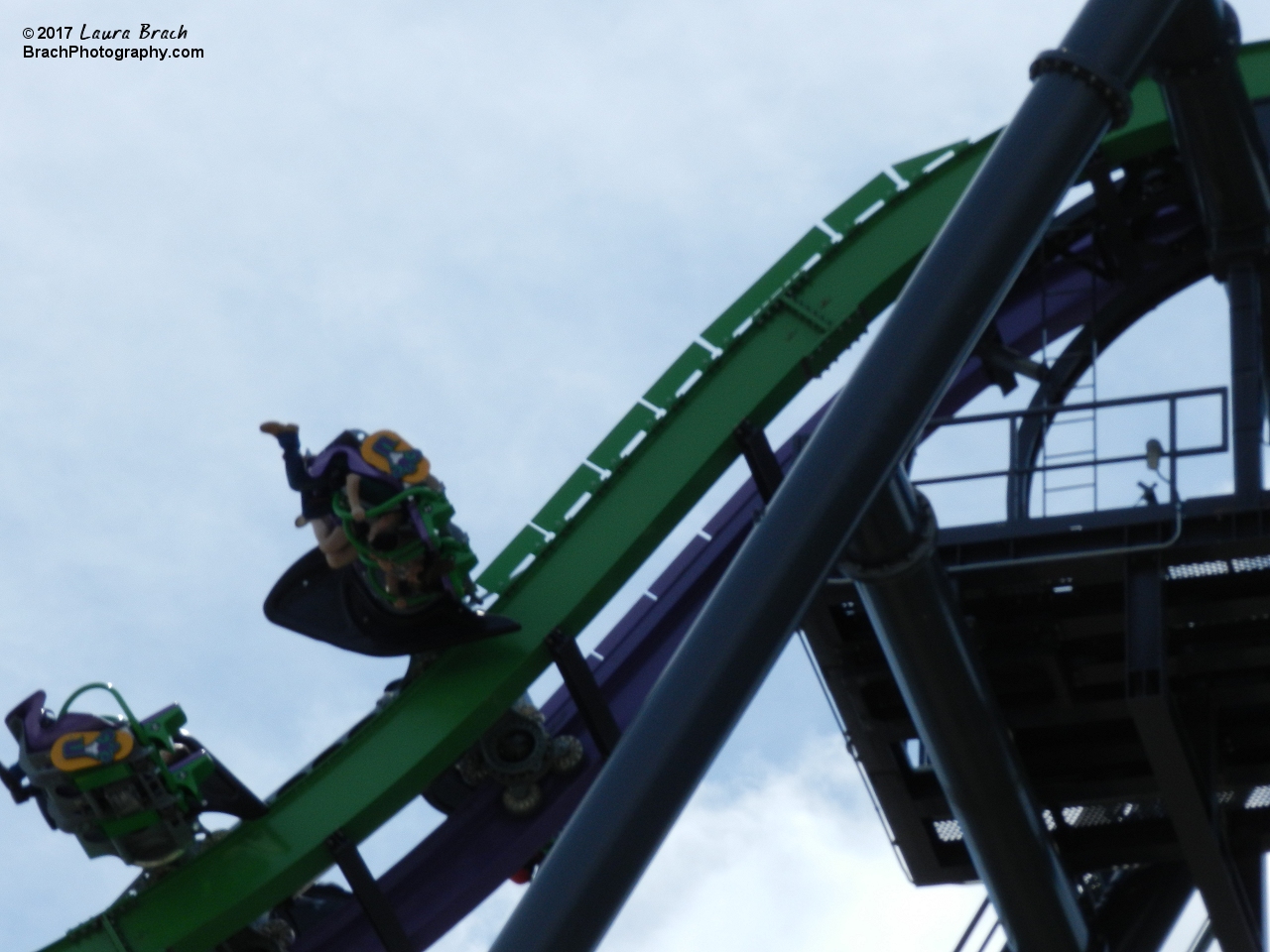 Joker train leaving the top of the lift hill.