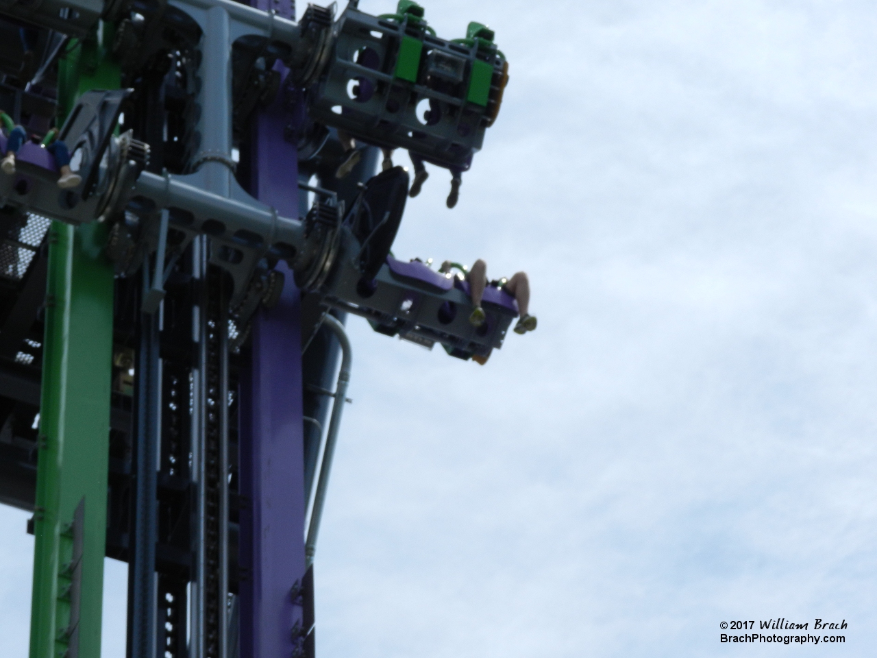 Joker train going up the 90-degree vertical lift hill.