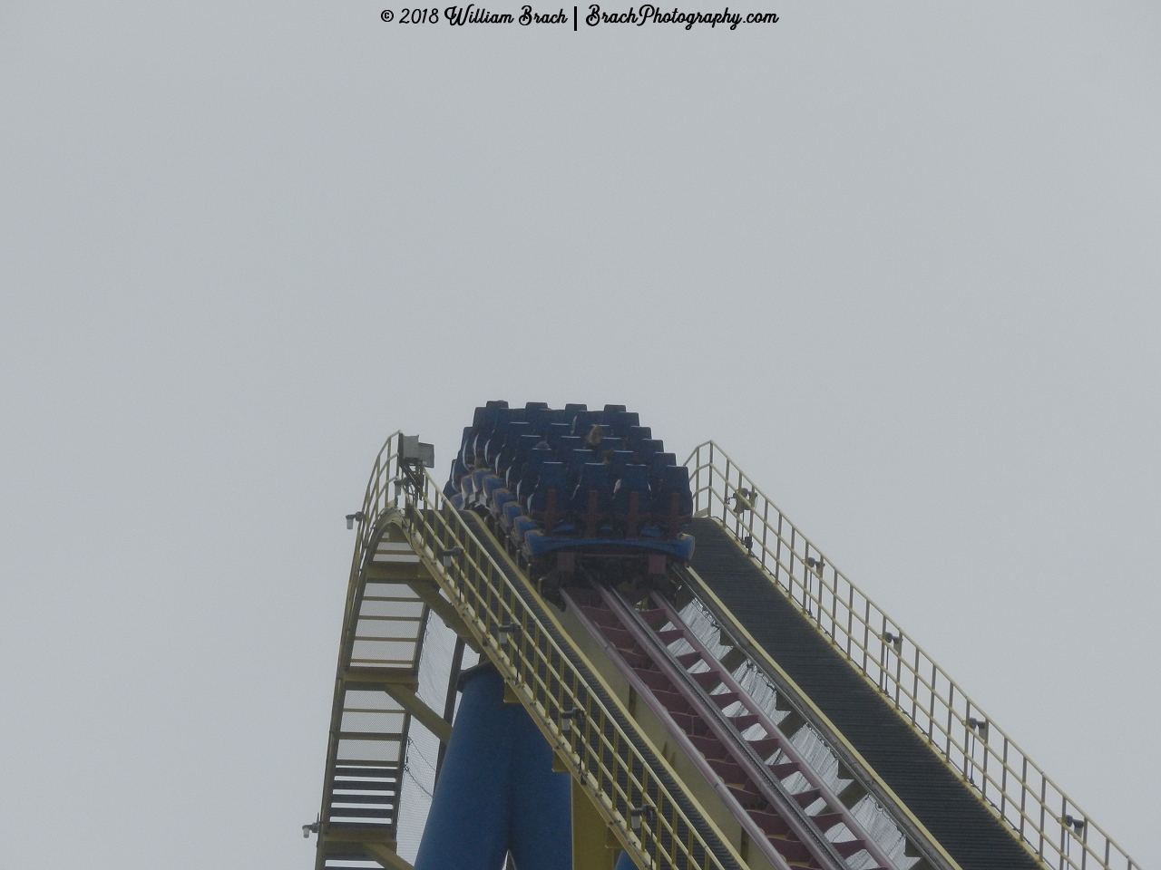 Nitro train cresting the top of the lift hill.