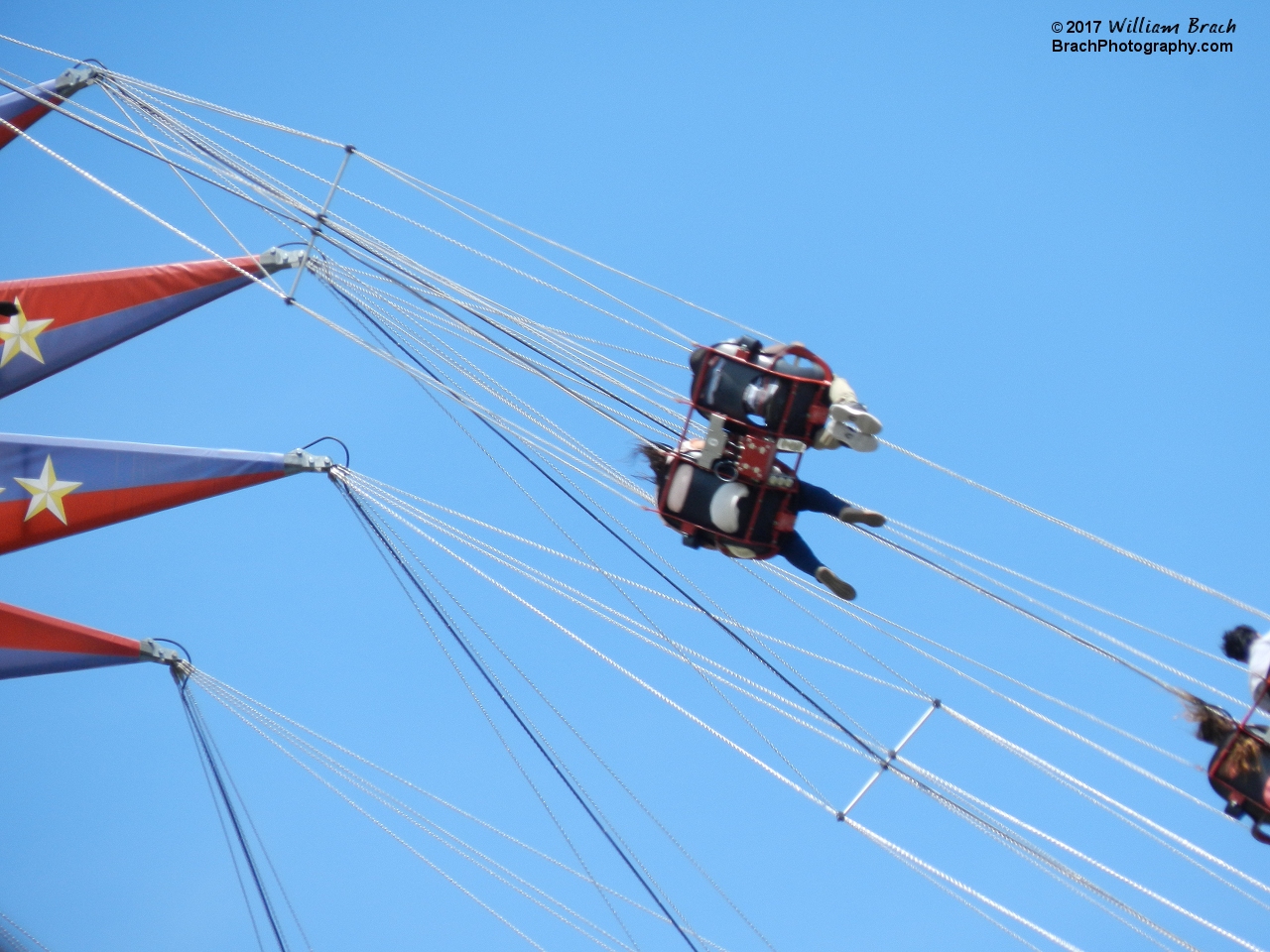 Riders up in the air on SkyScreamer.