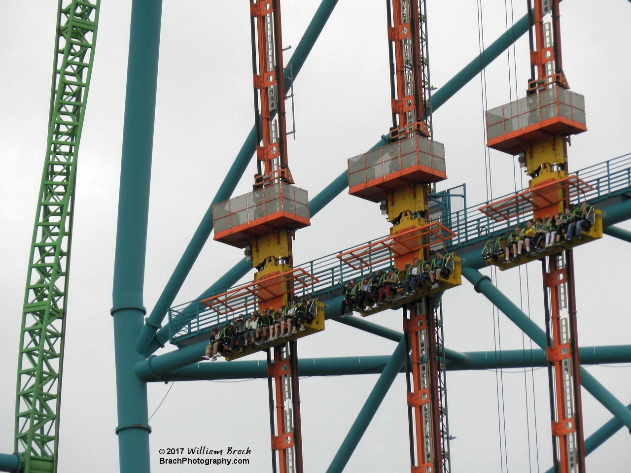 Zumanjaro: Drop of Doom gondola cars being pulled up to the 415-ft mark on the tower.