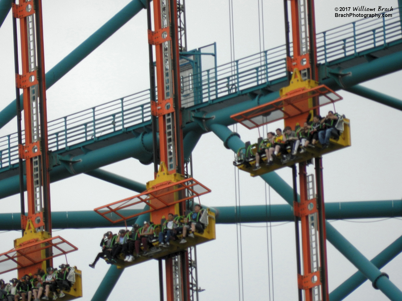 Zumanjaro: Drop of Doom gondola cars falling back down to the ground.