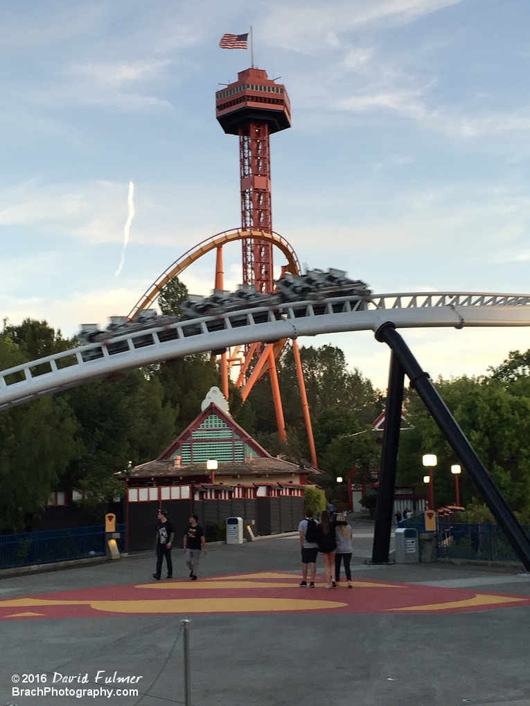 Full Throttle train rushing over the Superman Escape from Krypton entry plaza.