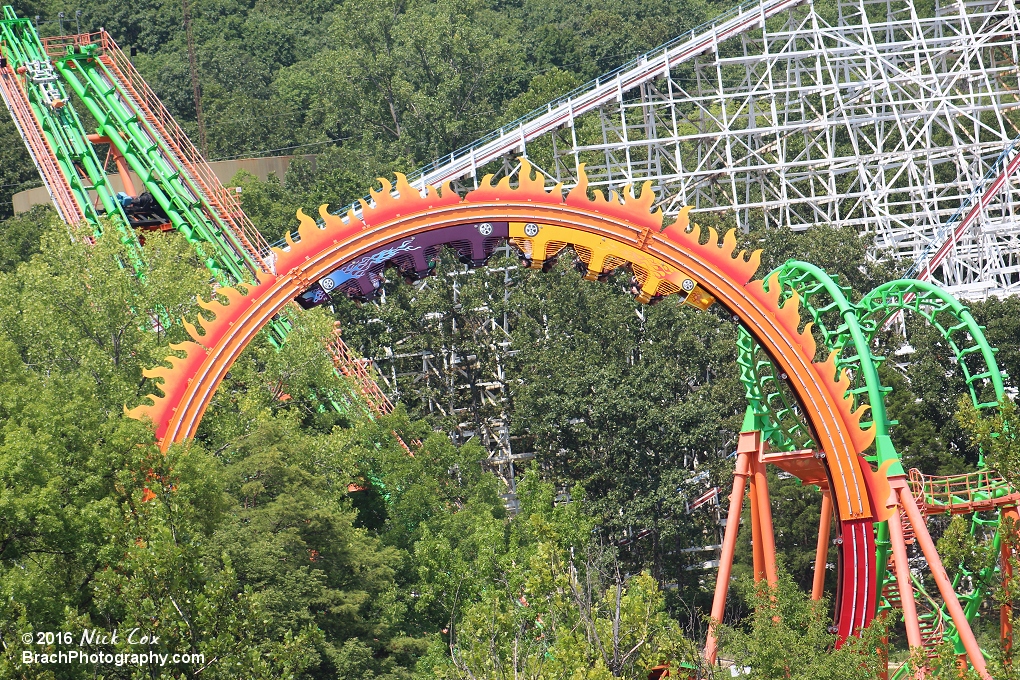 The train upside down from the Ferris Wheel.