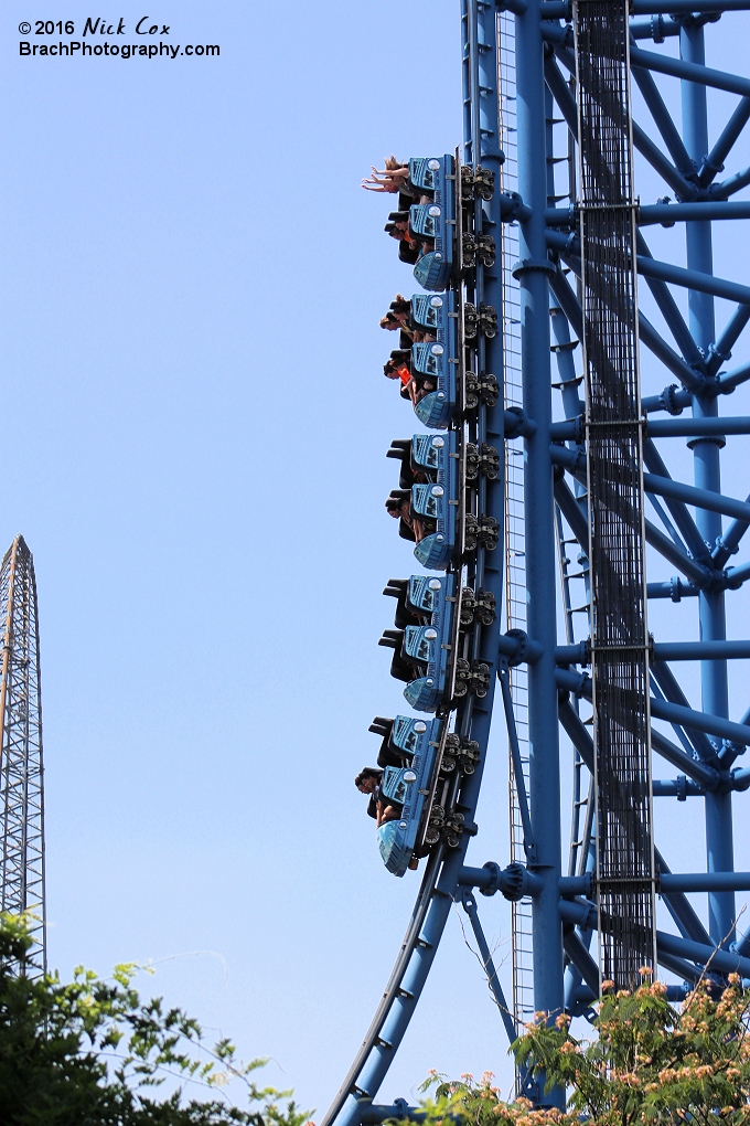 The train headed down the vertical drop.