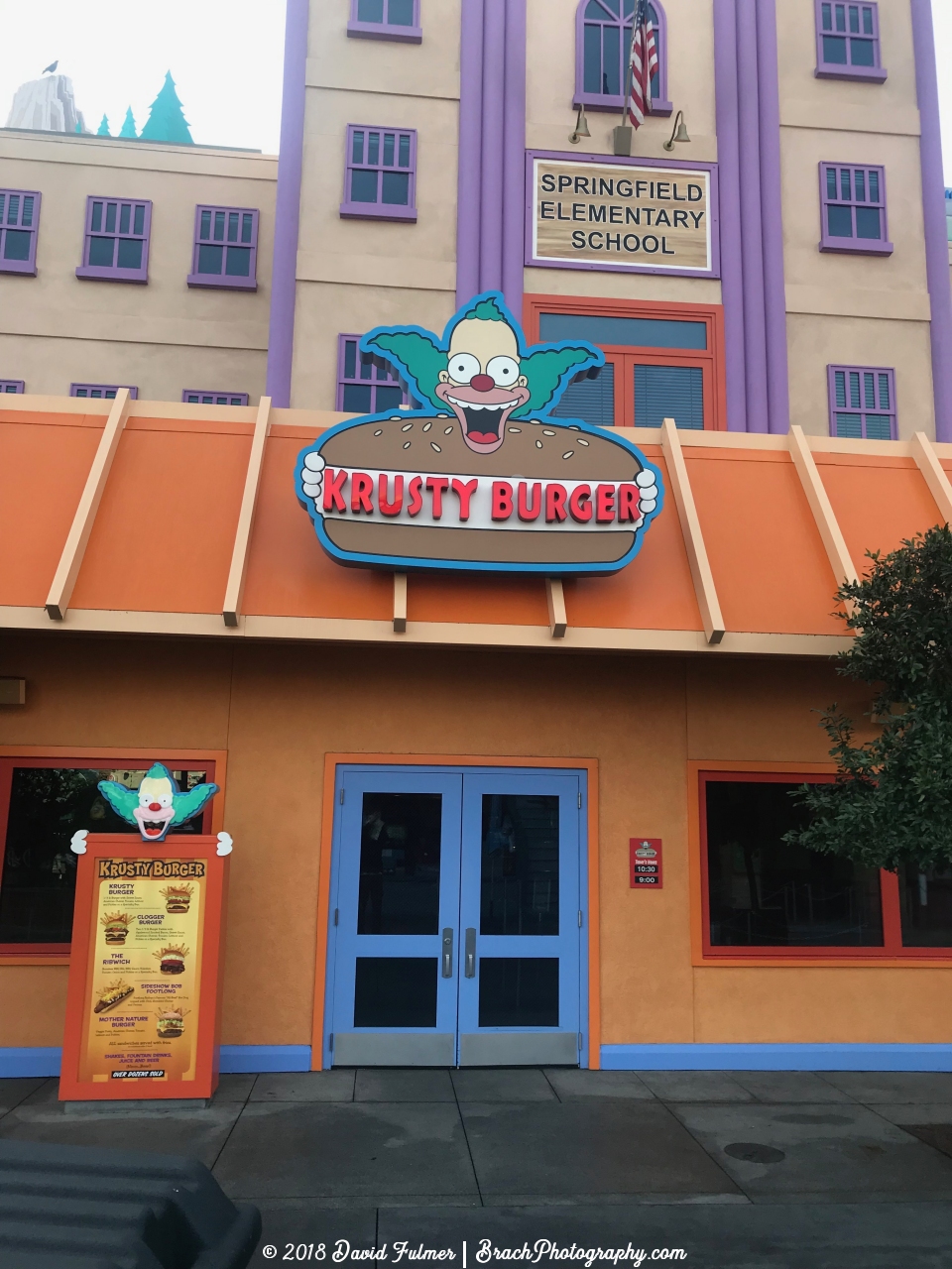 Not yet open for the day, but here's Krusty Burger!  I'll take a partially gelatinated non-dairy gum-based beverage flavored.....vanilla, please.