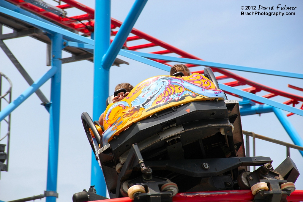 We can see UNDER the spinning car.